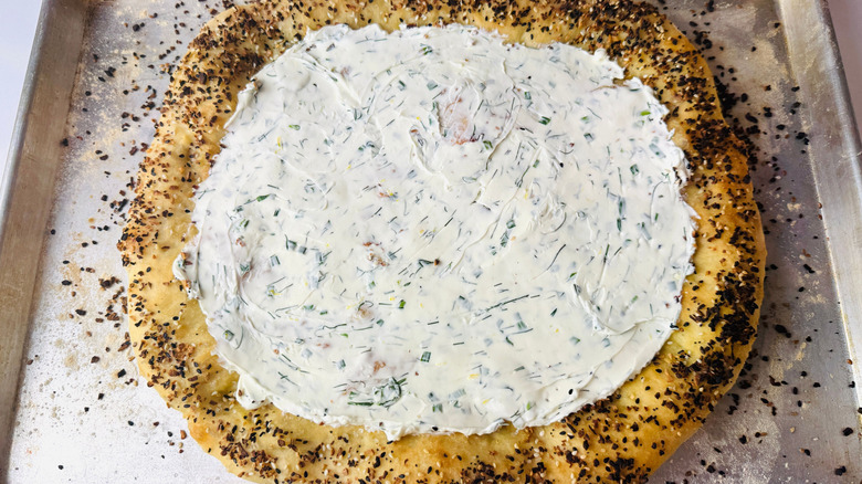Everything bagel pizza crust with herb cream cheese spread