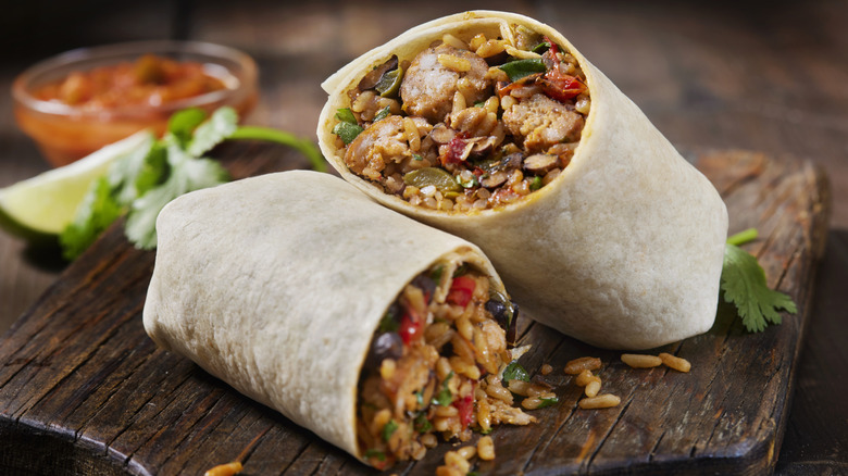 A burrito sliced in half