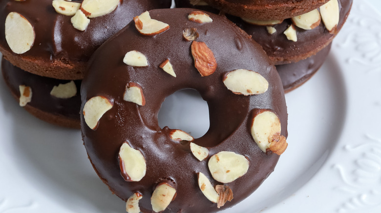chocolate donuts with sliced almonds