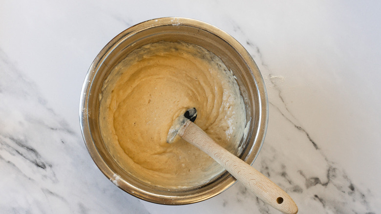 Cake donut batter in bowl.