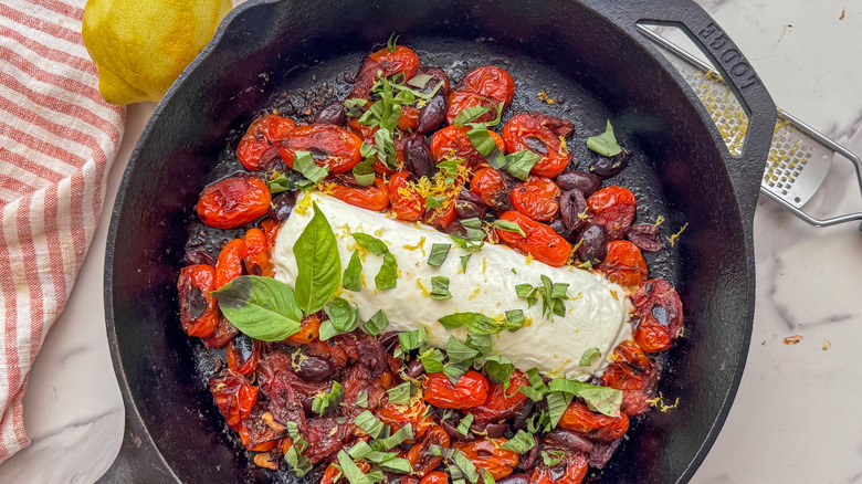 finished baked goat cheese in skillet