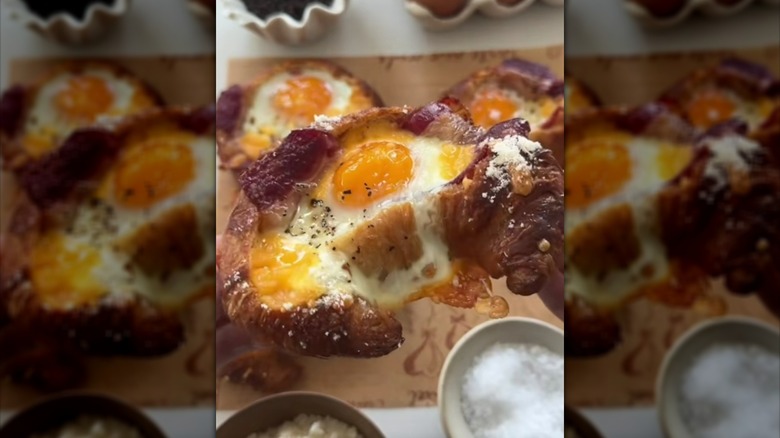 Hollowed-out croissant with an egg baked into it