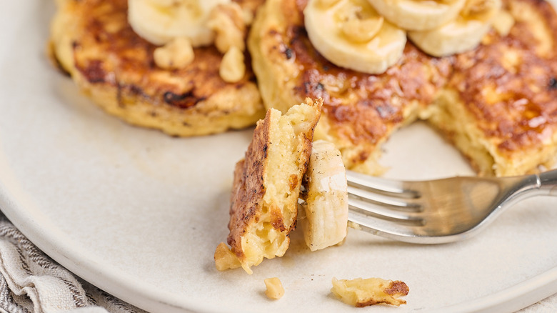 Pancake and banana on a fork