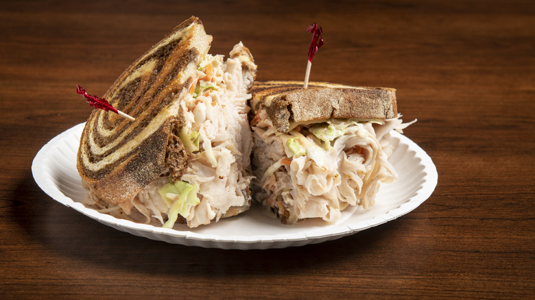 Turkey sandwich with coleslaw on rye bread