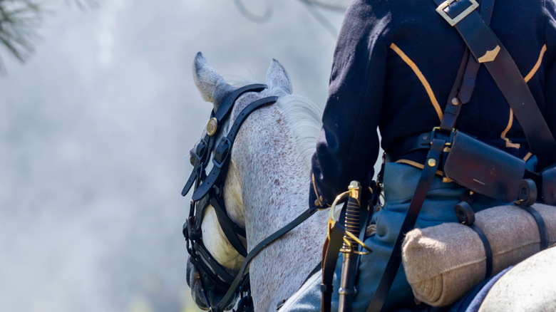 Civil War reenactor on horseback