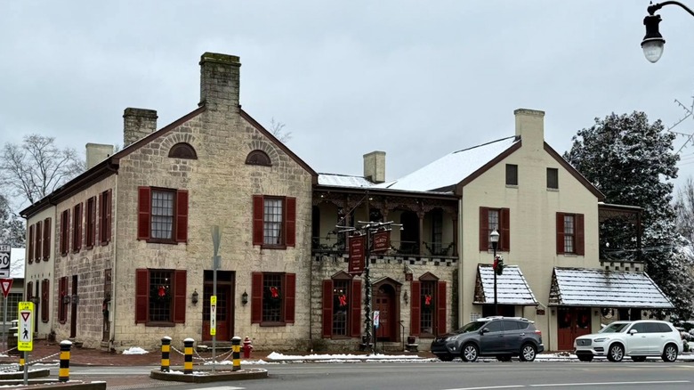 Stone exterior of the Old Talbott Tavern on a snowy day