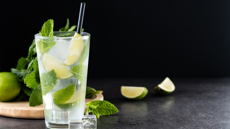 Classic mojito in tall glass on bar