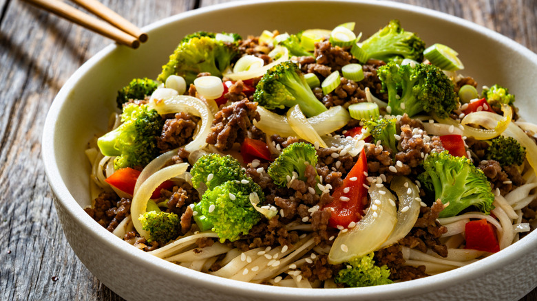 Ground beef with stir-fried veggies.
