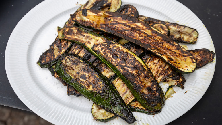 A plate of charred, grilled zucchini