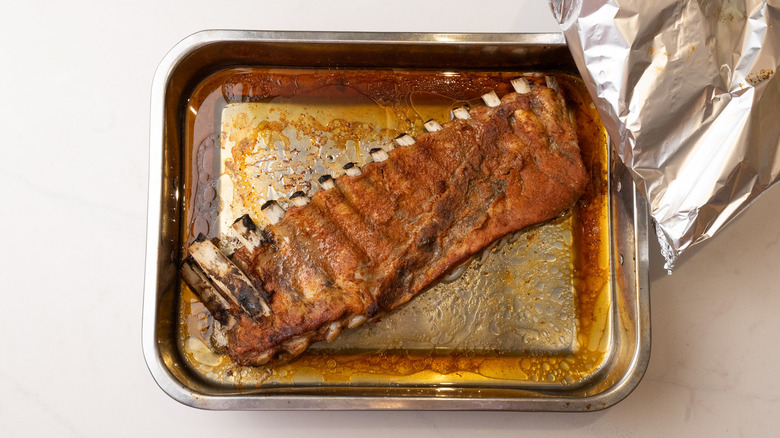 cooked ribs in oven tray