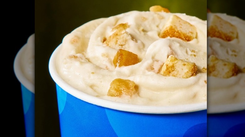 A close beauty shot of the top of a Dairy Queen Caramel Apple Cheesecake Blizzard