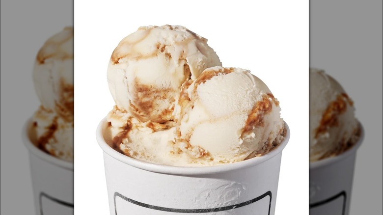 A couple of scoops of Salt & Straw Salted Caramel Apple Pie ice cream in a cup