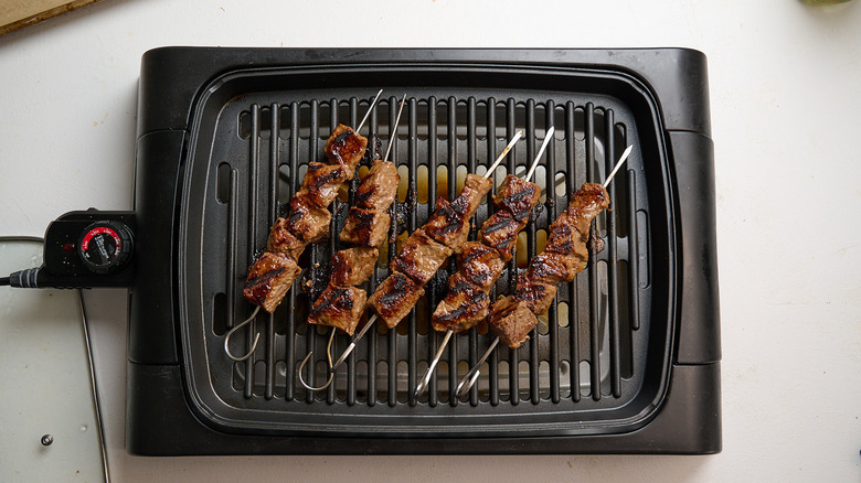 grilled kebabs on a grill