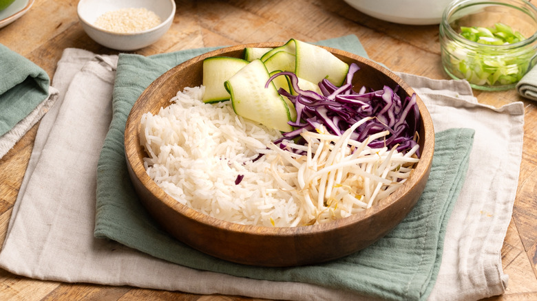 assembling beef bulgogi rice bowls