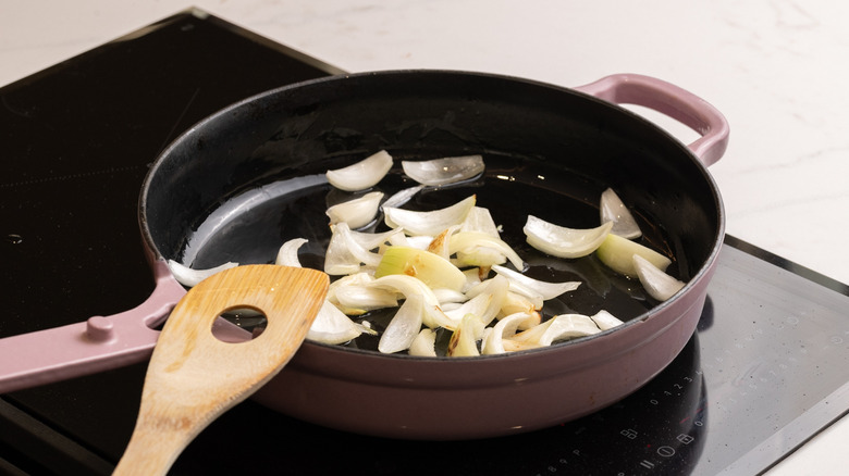 stir-frying onion in pan