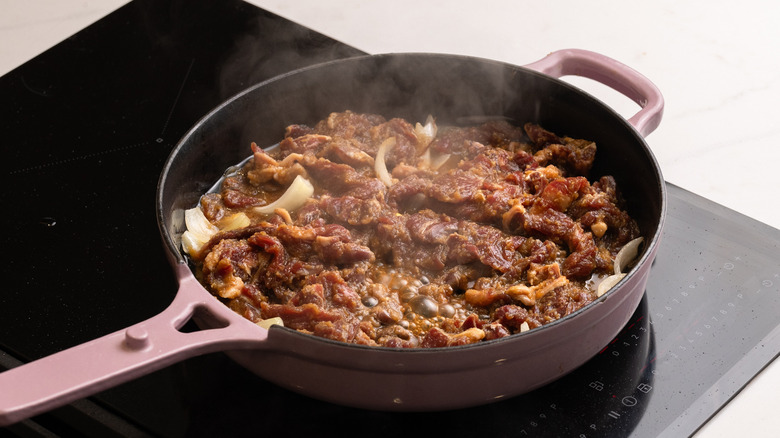 beef bulgogi cooking in pan