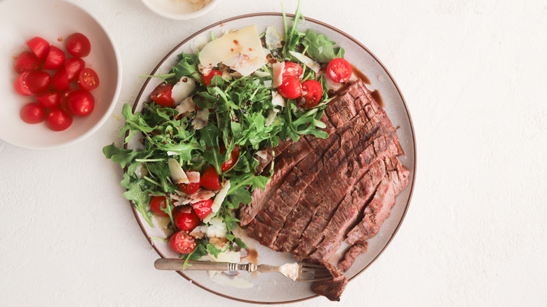 Grilled beef with tomato salad