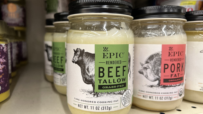Jars of beef tallow on grocery store shelves