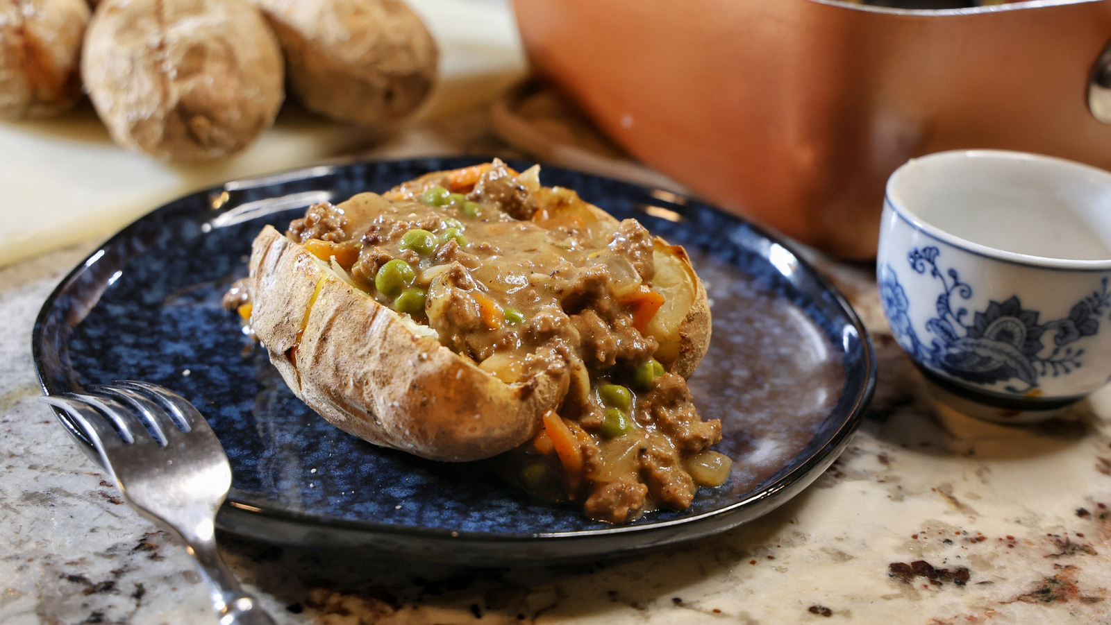 Beefy English Jacket Potatoes Recipe - Tasting Table