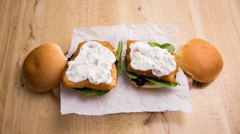breaded fish sandwiches on table