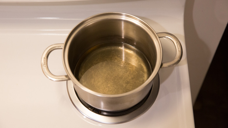 oil in pot on stove