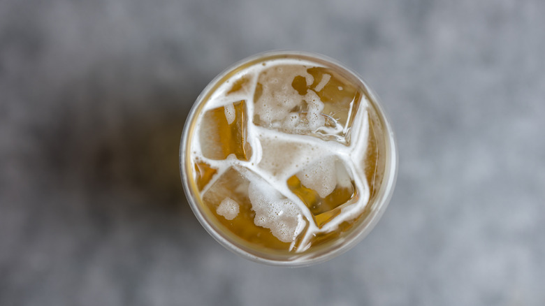 aerial shot of beer with ice in it