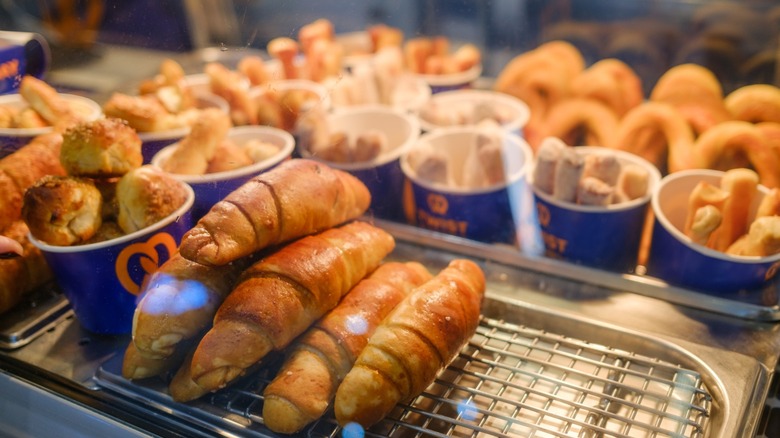 The display of hot pretzels ready to be served at an Auntie Anne's location