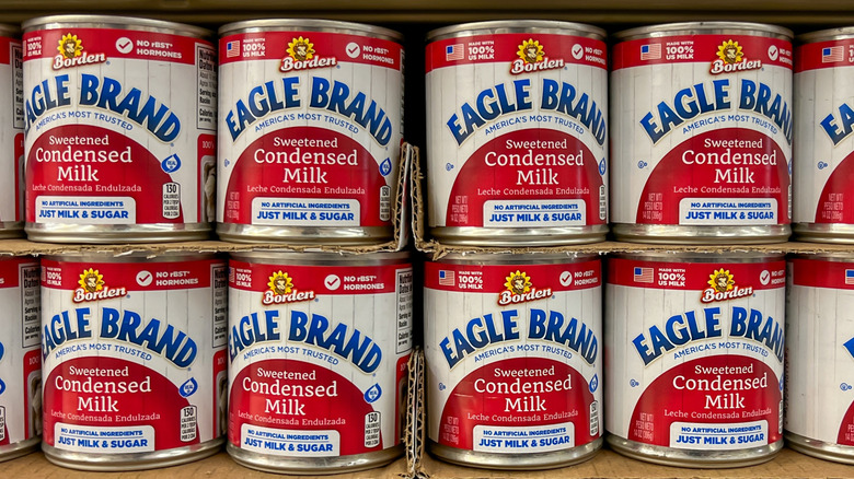 cans of Borden Eagle Brand sweetened condensed milk