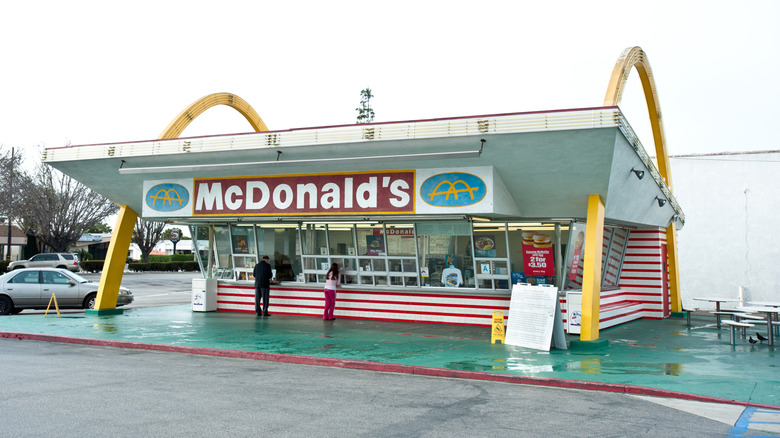 A McDonald's franchise built in 1955 in Des Plaines, Illinois, featuring the iconic architectural golden arches on each side of the building