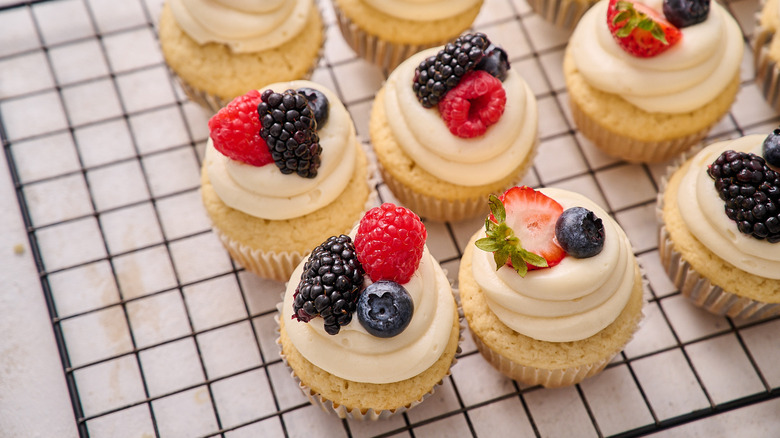 cupcakes topped with berries