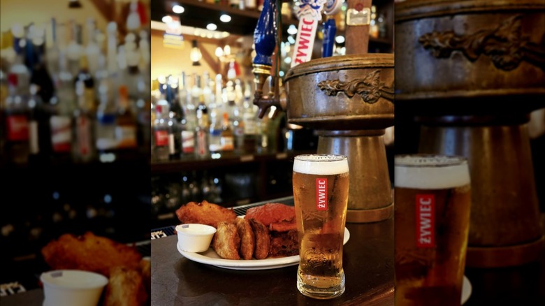 Beer and plate of food at Karczma bar