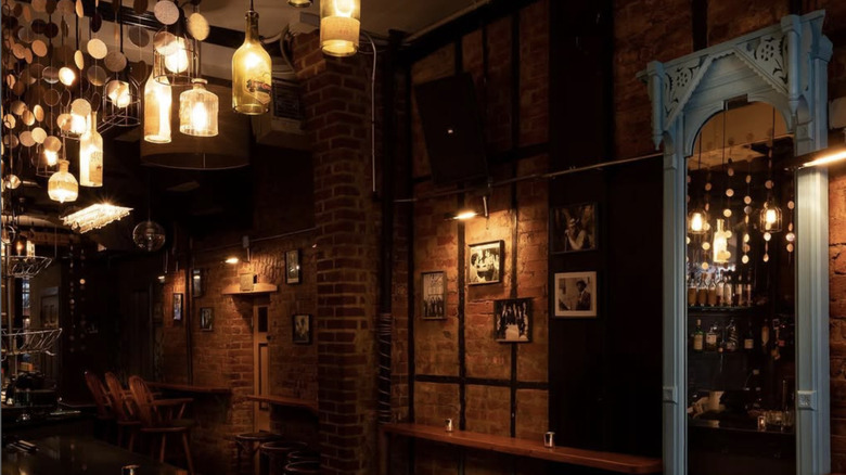 Brick interior of the Summit Bar with dim lights