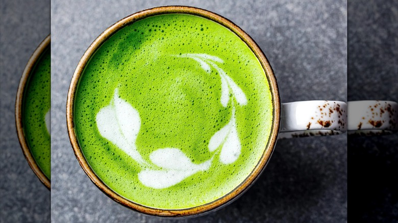 Overhead shot of matcha latte in mug