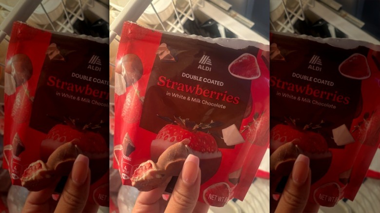 customer holding chocolate strawberries package