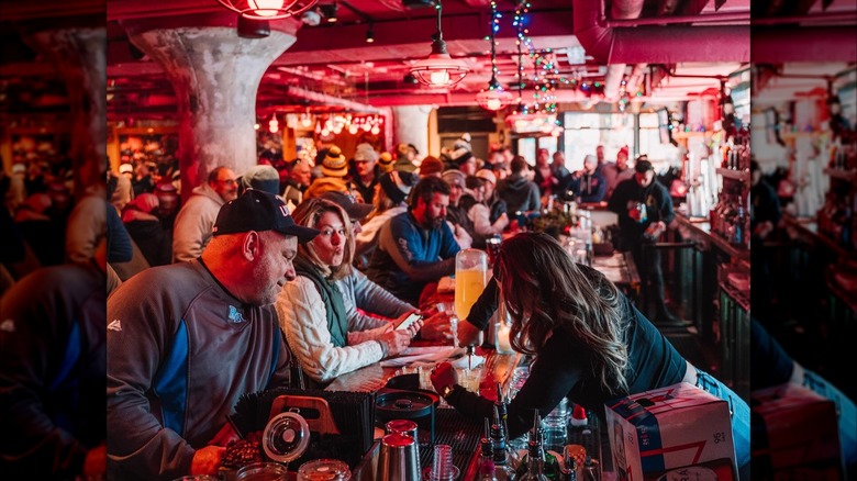 Packed bar interior of Loretta's Last Call