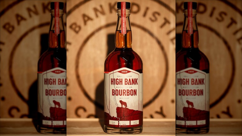 High Bank Bourbon withwooden distillery logo background