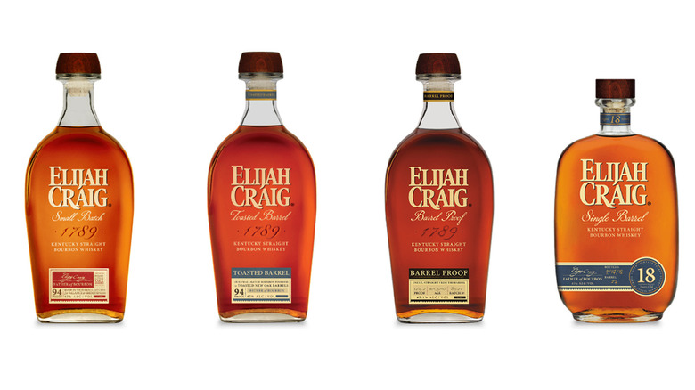 Elijah Craig bourbon bottles lineup against a white background