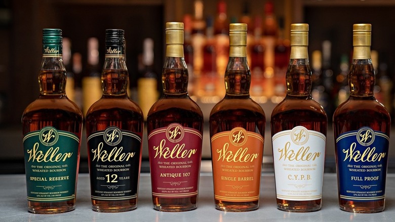 Weller bourbon bottles lineup on a bar