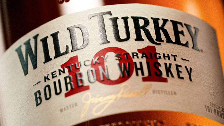 A close up shot of the label from a bottle of Wild Turkey 101