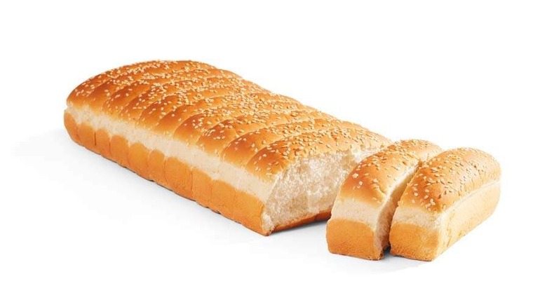 A loaf of Klosterman's Seeded Enriched Bread on white background
