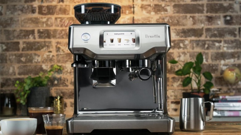 A Breville Barista Touch espresso machine on a counter