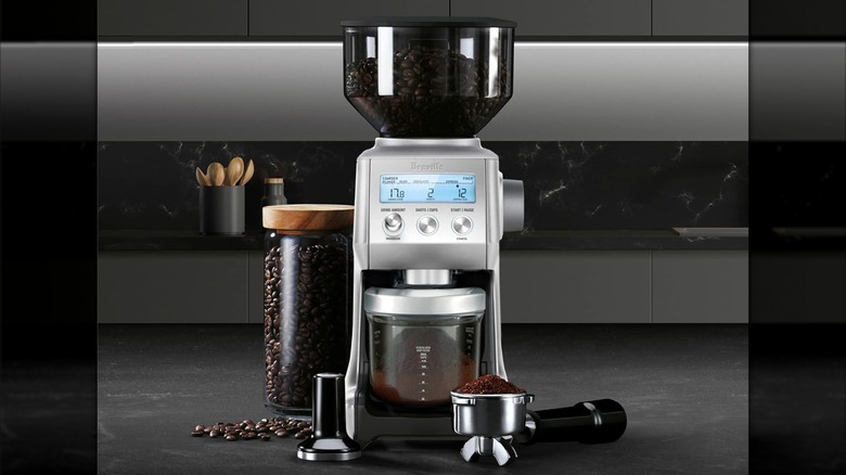 A Breville smart grinder pro coffee mill on a counter