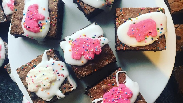 Overhead shot of brownies topped with frosting and animal crackers