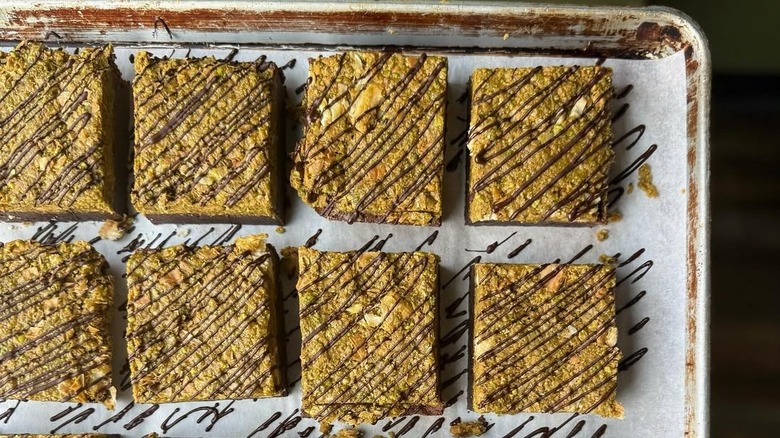 Tray of Dubai chocolate brownies drizzled with chocolate