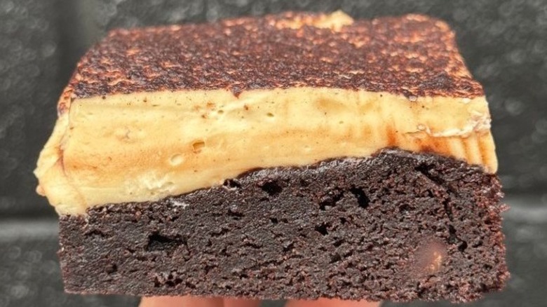 Close up of brownie topped with tiramisu cream