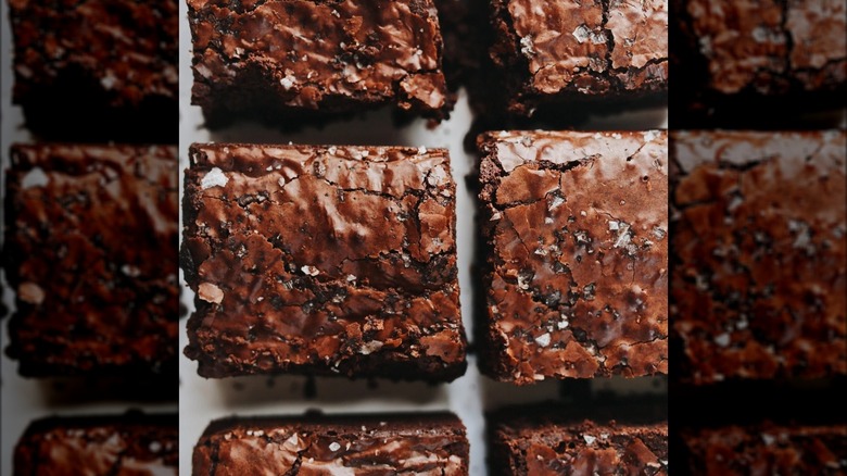 Overhead shot of six brownies topped with flaky sea salt