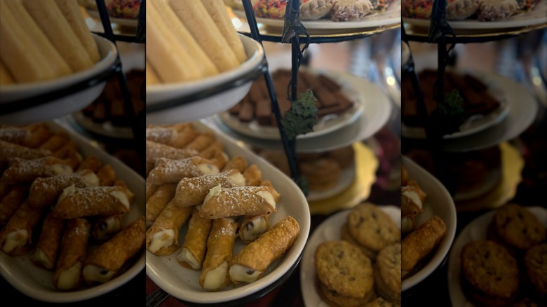 Assortment of desserts including cannoli and cookies