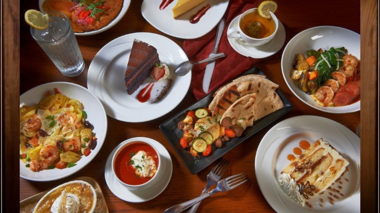 Assortment of dishes on white plates