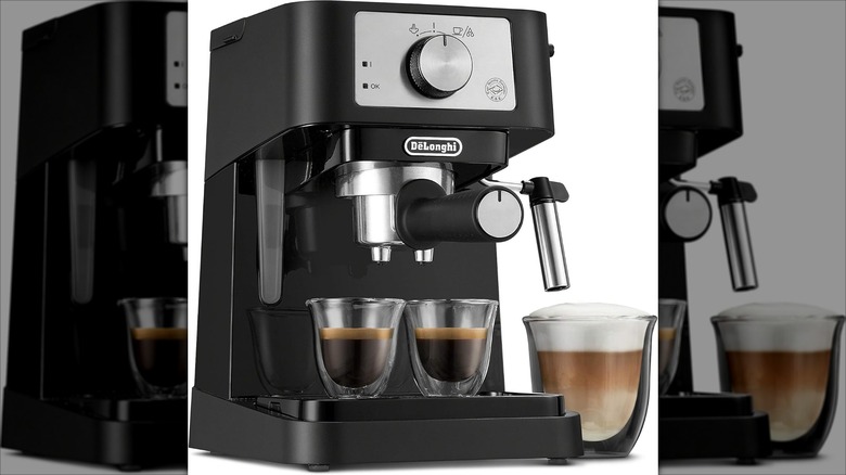 De'Longhi manual espresso machine with two shots of espresso and a cappuccino