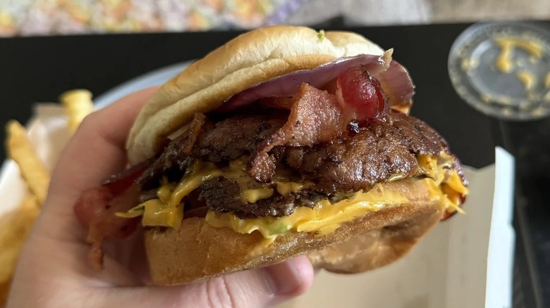 close up of a person holding a Culver's